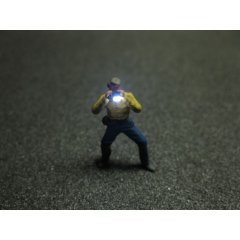 Modell Figur Mann mit Fotoapparat LED Blitzlicht Spur H0