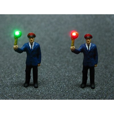 Modell Figur Schaffner mit Kelle LED Beleuchtung zweifarbig H0
